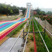 景区彩虹滑道厂家整体规划设计大型滑梯主题乐园七彩旱滑道