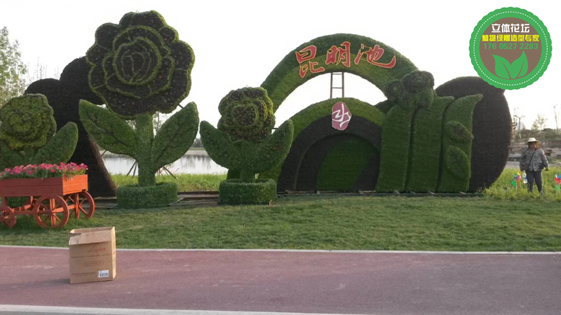 乐山大型景观花篮，2022春节植物雕塑，节日绿雕