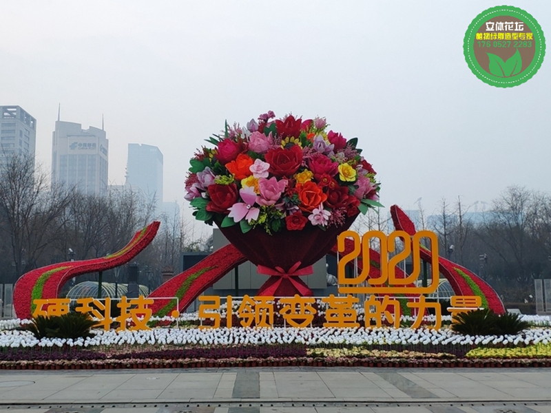 乐山大型景观花篮，2022春节植物雕塑，节日绿雕