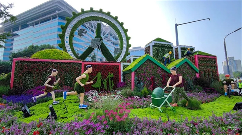 天镇二十立体花坛大绿雕制作团队 五一节造型