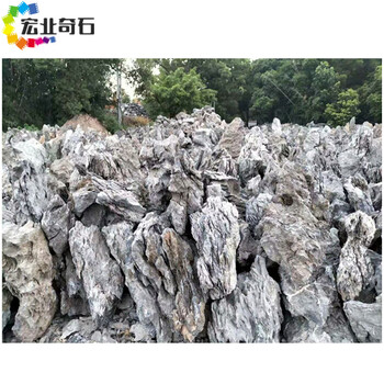 英德酸洗青龍石-清遠(yuǎn)花園青龍石假山-青龍石造景假山案例