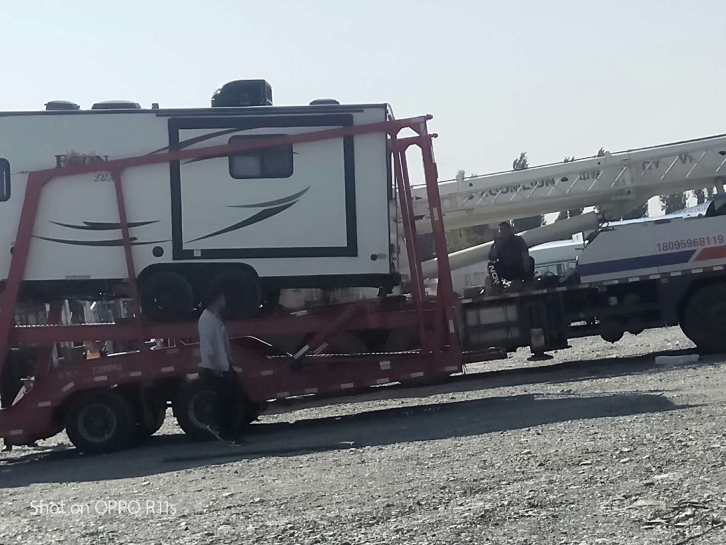 沙湾事故车拖运去哈巴河运车帮托运一台车多少钱？