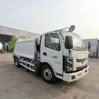 藍(lán)牌壓縮垃圾車報價多利卡5噸壓縮垃圾車