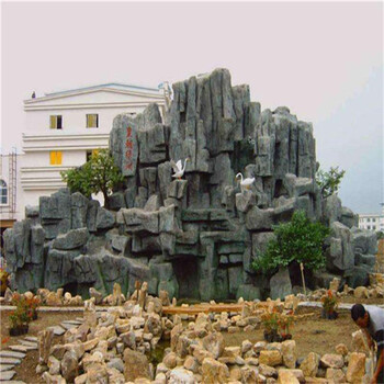 汕头假山喷泉庭院流水鱼池设计,仿真塑石假山设计